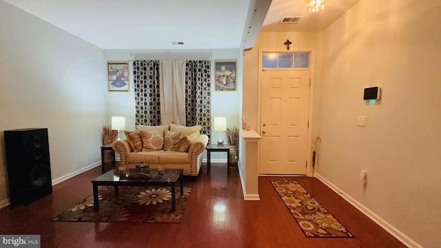 foyer featuring dark wood-type flooring