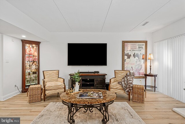 living room featuring light wood-type flooring