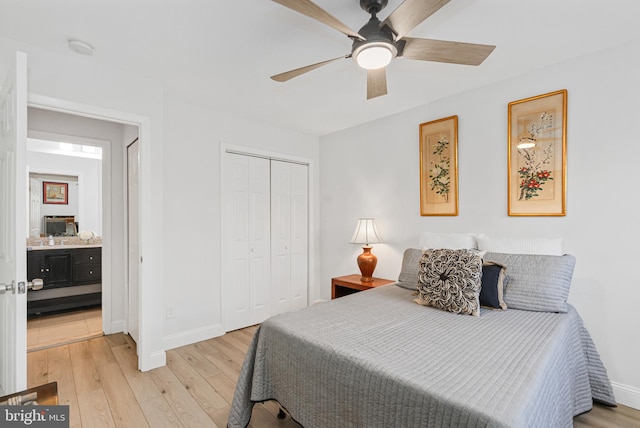 bedroom featuring ceiling fan, light wood-type flooring, and a closet