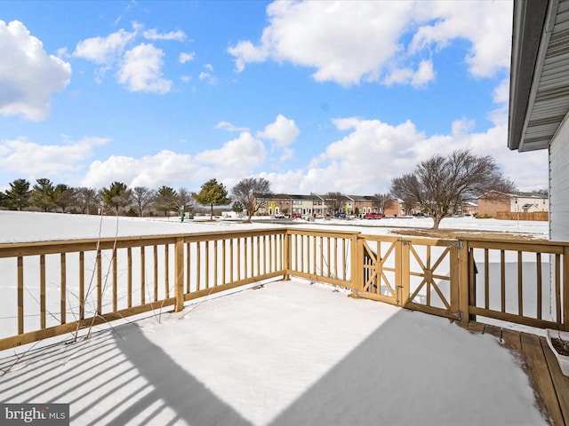 view of snow covered deck