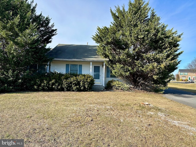 view of front of home with a front yard