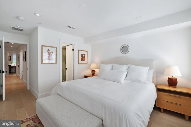 bedroom with light wood-type flooring