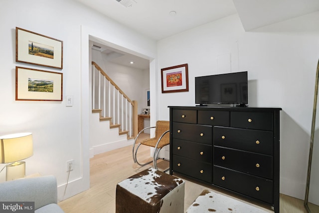 sitting room with light hardwood / wood-style floors