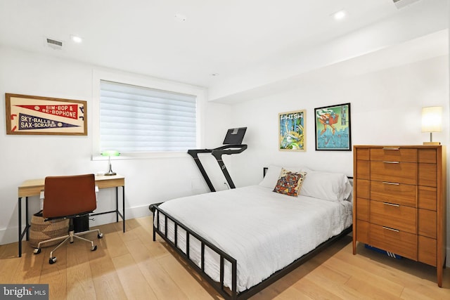 bedroom featuring light hardwood / wood-style flooring