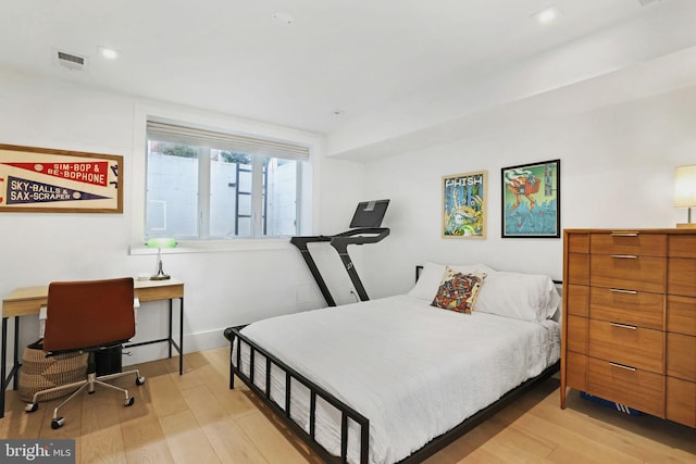 bedroom featuring light hardwood / wood-style floors