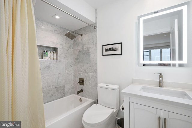 full bathroom featuring vanity, toilet, and shower / bath combo