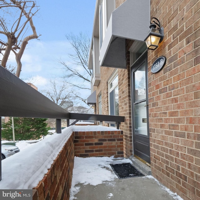 view of snow covered patio