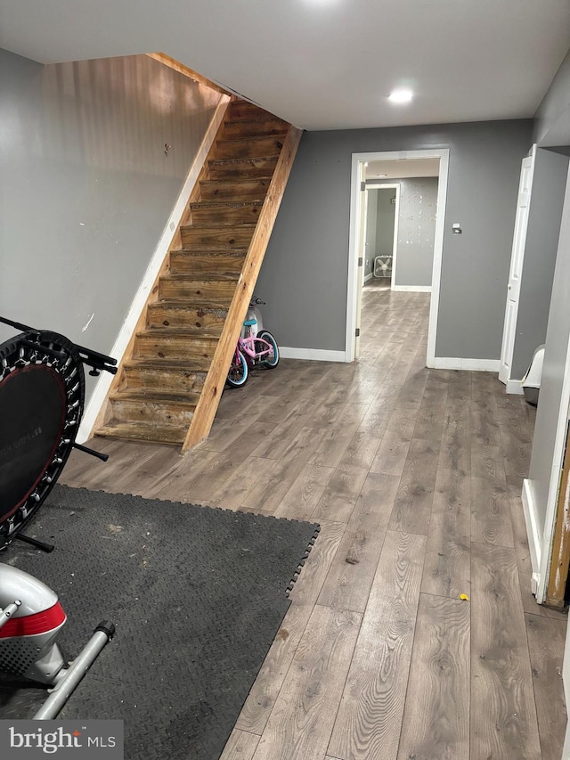 interior space with hardwood / wood-style flooring