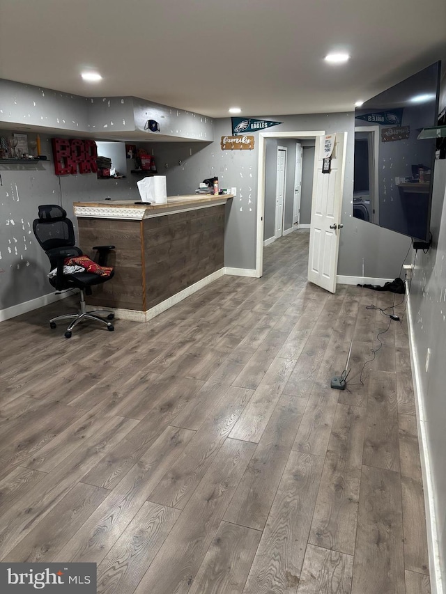 bar featuring hardwood / wood-style floors