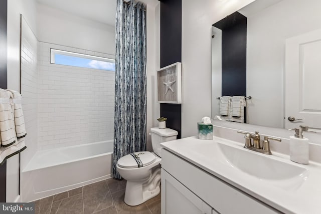 full bathroom featuring tile patterned flooring, vanity, shower / bath combination with curtain, and toilet