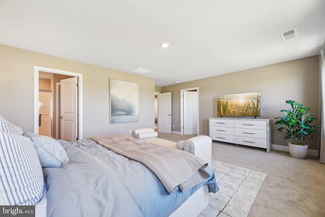 carpeted bedroom featuring connected bathroom