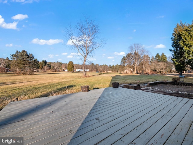 wooden deck with a yard