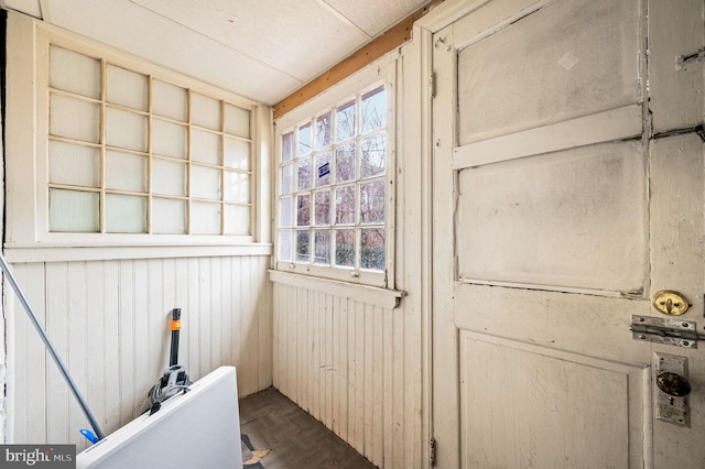 room details with wood walls and parquet flooring