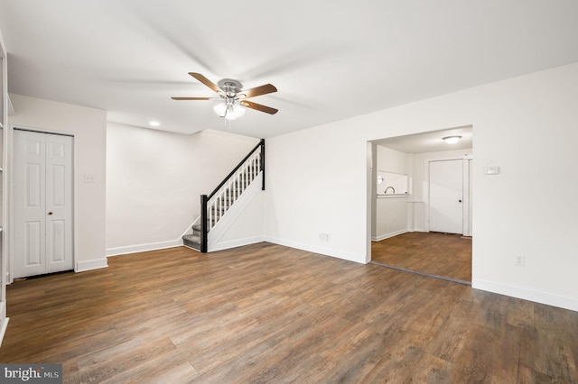 unfurnished room featuring ceiling fan and wood-type flooring