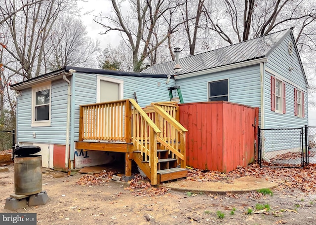 exterior space featuring a wooden deck