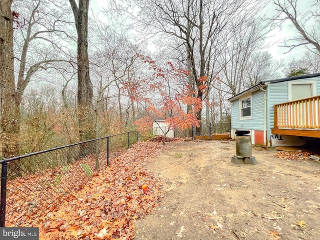 view of yard featuring a deck