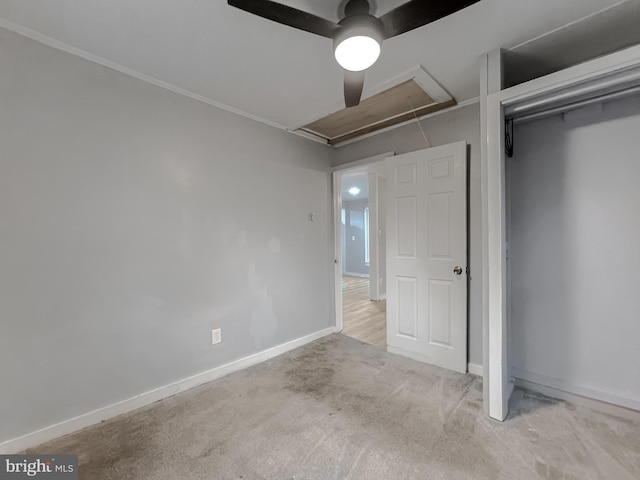 unfurnished bedroom with light carpet, a closet, and ceiling fan