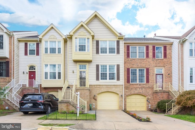 multi unit property featuring a garage