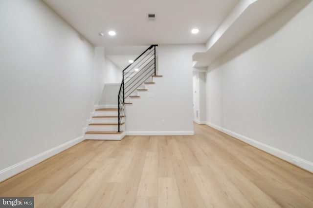 interior space with hardwood / wood-style floors