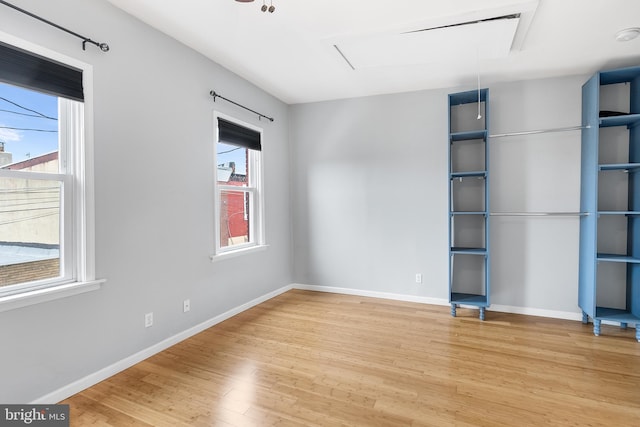 interior space featuring light wood-type flooring and a wealth of natural light