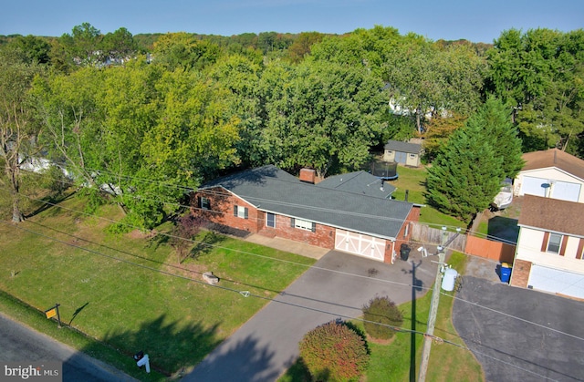 bird's eye view featuring a view of trees