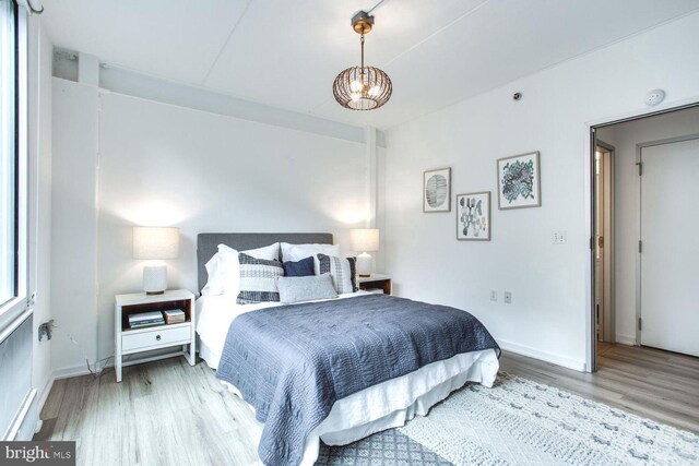 bedroom featuring hardwood / wood-style floors