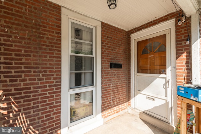 entrance to property with a porch