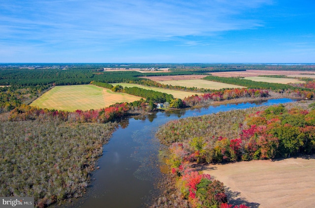 birds eye view of property featuring a rural view and a water view