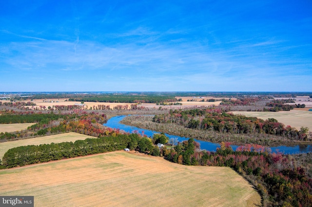 drone / aerial view with a rural view and a water view