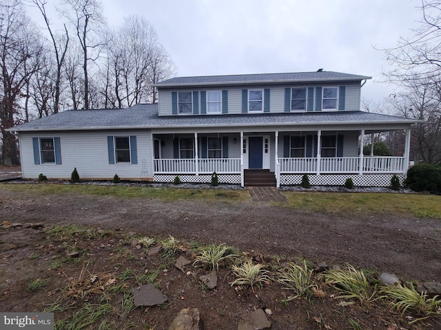 farmhouse inspired home with covered porch