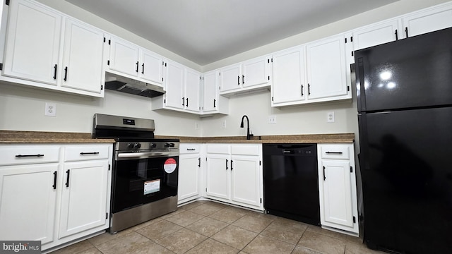 kitchen featuring black appliances and white cabinetry