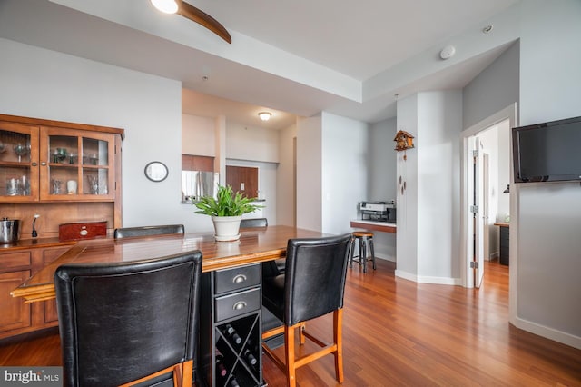 dining room with dark hardwood / wood-style floors