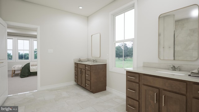 bathroom featuring tile patterned floors and vanity