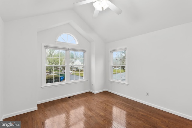 spare room with wood-type flooring, ceiling fan, and lofted ceiling