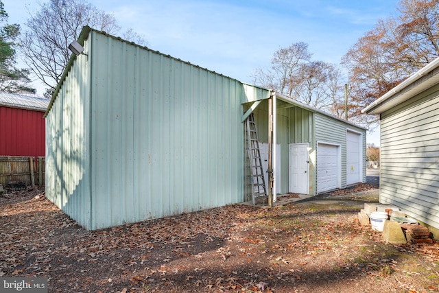 view of outdoor structure with a garage