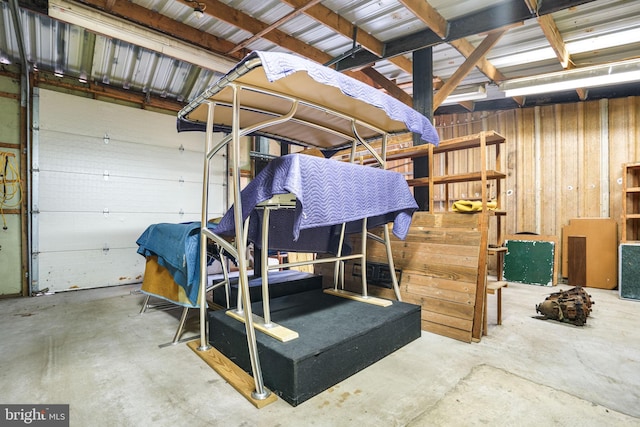 garage with wood walls