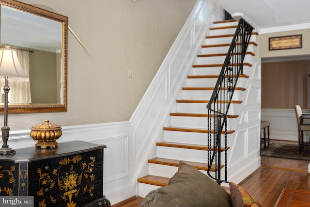 stairs with wood-type flooring