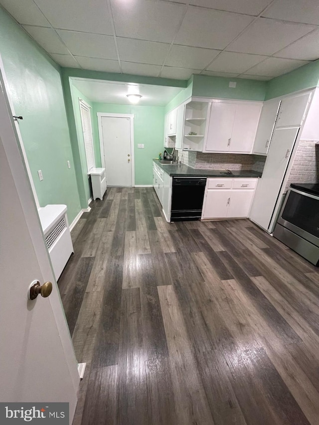 414 Commonwealth Ave, Trenton, NJ 08629 - kitchen with black dishwasher, open shelves, dark countertops, electric stove, and white cabinets