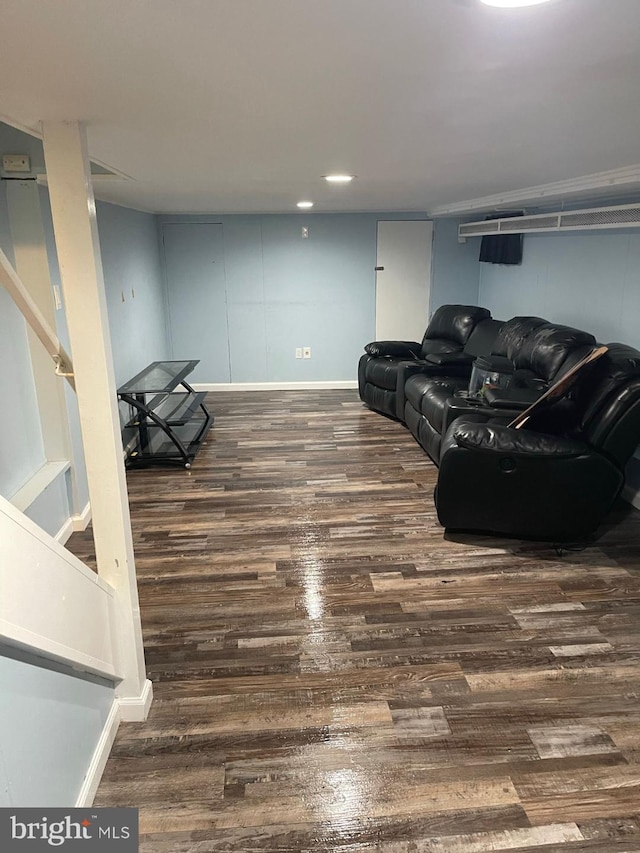 living room with dark hardwood / wood-style floors