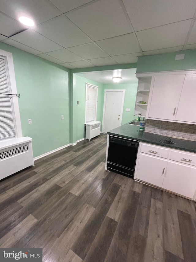414 Commonwealth Ave, Trenton, NJ 08629 - kitchen with black dishwasher, open shelves, dark countertops, white cabinets, and a paneled ceiling