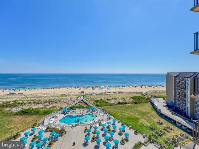 aerial view with a beach view and a water view