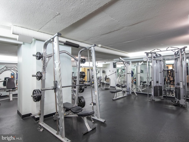701 S Edgewater House Rd Unit 701S, Bethany Beach, DE 19930 - exercise room with a textured ceiling