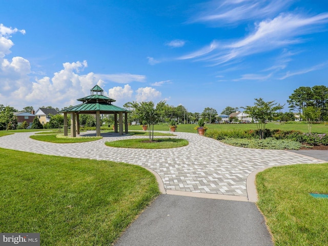 701 S Edgewater House Rd Unit 701S, Bethany Beach, DE 19930 - view of property's community featuring a gazebo, curved driveway, and a lawn
