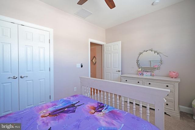 bedroom featuring carpet flooring, a closet, and ceiling fan