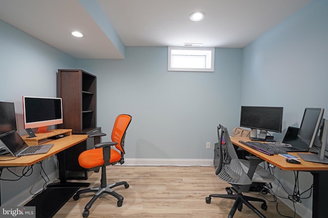 office area with light wood-type flooring