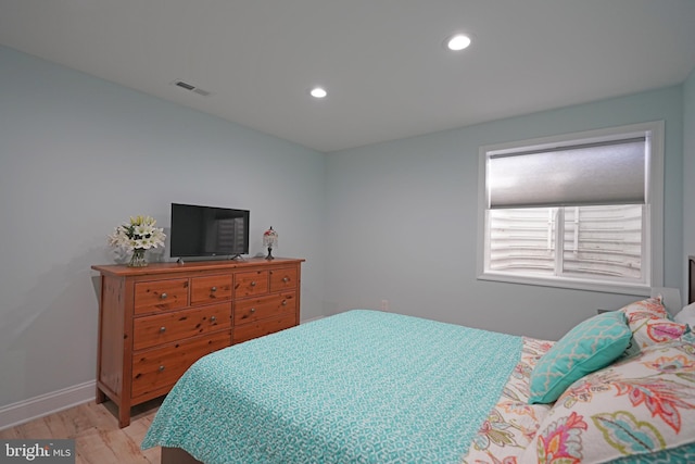 bedroom featuring light hardwood / wood-style floors