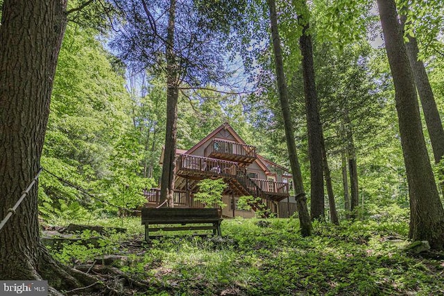 exterior space featuring a wooden deck