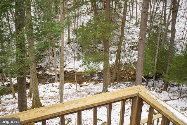 view of snow covered deck