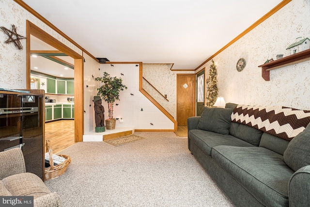 carpeted living room featuring ornamental molding