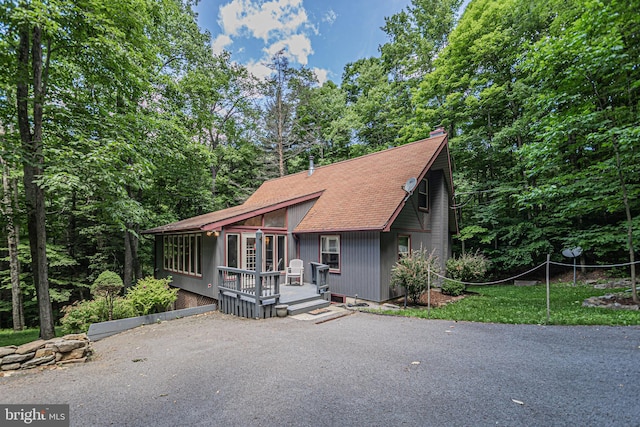 view of front of house with a wooden deck